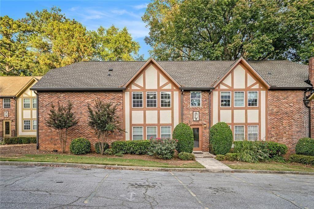 2825 Northeast Expressway, Unit F3 Atlanta, GA 30345 - Photo 44 of 45 a front view of a house with garden