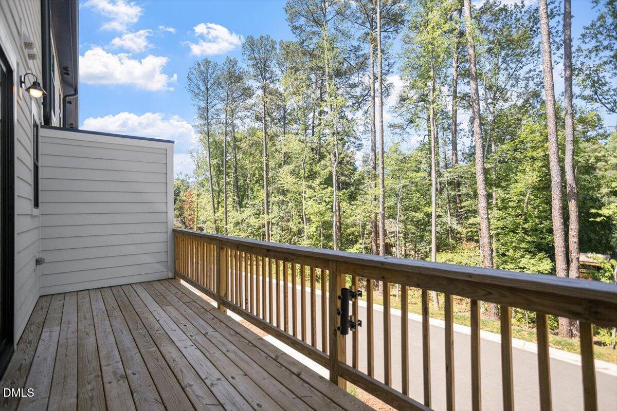6419 Tanner Oak Lane Raleigh, NC 27613 - Photo 37 of 39 a view of a balcony with wooden floor
