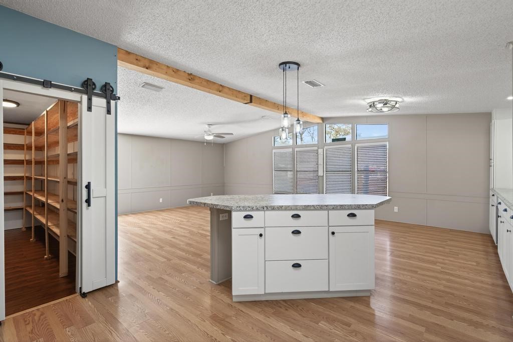 2744 Roy Sikes Road Hilliard, FL 32046 - Photo 16 of 97 a view of a kitchen with wooden floor