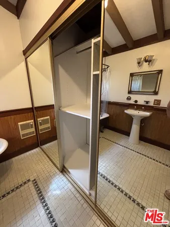 a kitchen with stainless steel appliances granite countertop a refrigerator and a stove