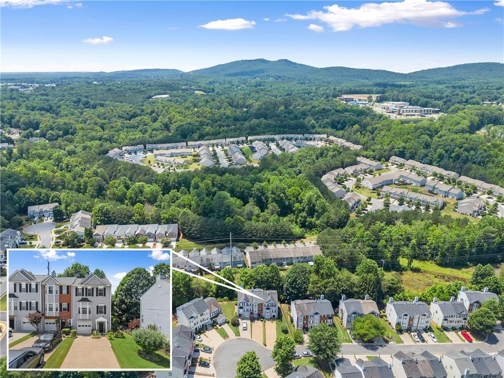 1628 Indian Way Cumming, GA 30040 - Photo 34 of 39 an aerial view of a house with a garden