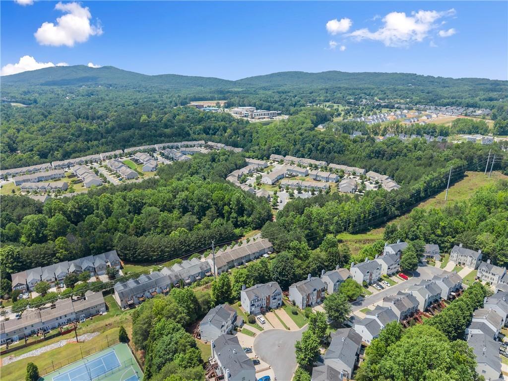 1628 Indian Way Cumming, GA 30040 - Photo 36 of 39 a view of a city with lush green forest