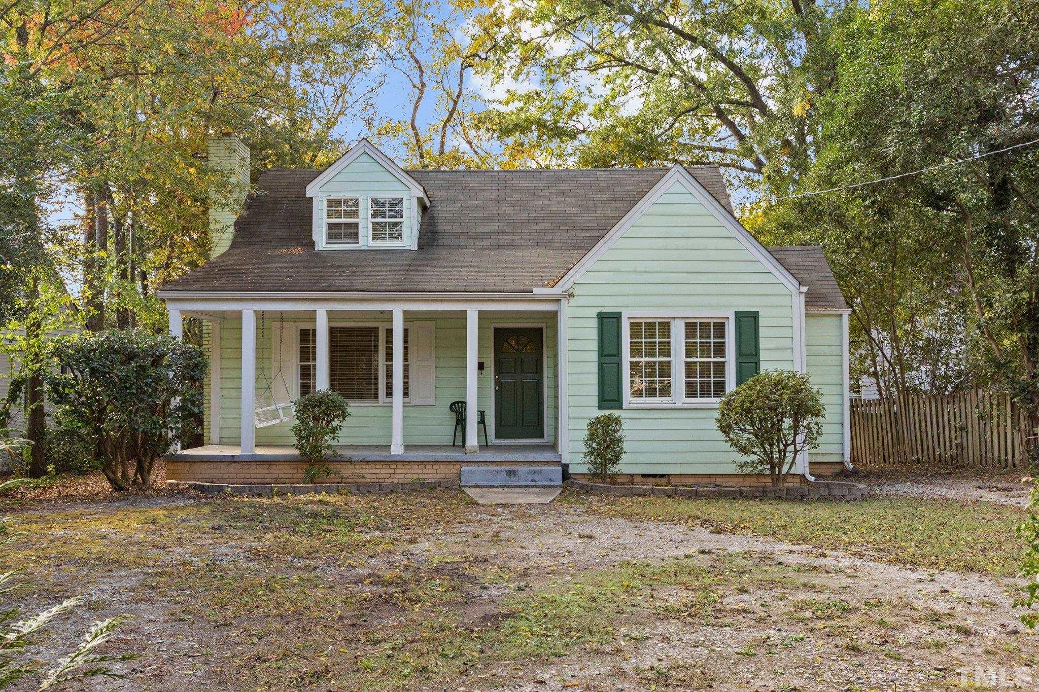 1713 Oberlin Road Raleigh, NC 27608 - Photo 2 of 34 front view of a house with a yard