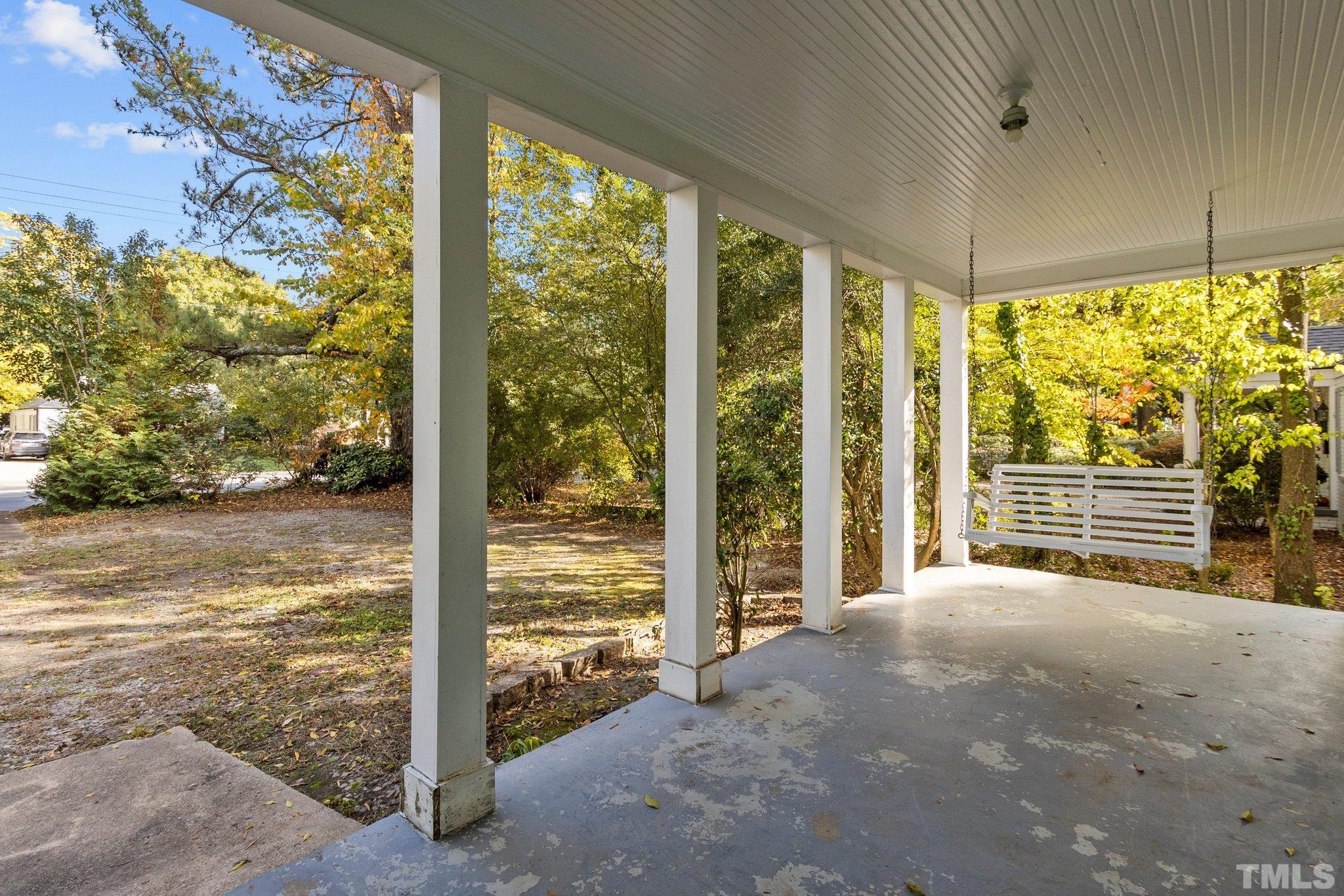 1713 Oberlin Road Raleigh, NC 27608 - Photo 3 of 34 a view of a room with a large window
