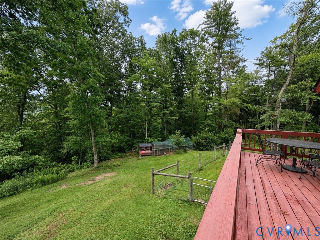 65 Cubbley Road Hot Springs, VA 24445 - Photo 14 of 50 Expansive wood deck with a red stain finish