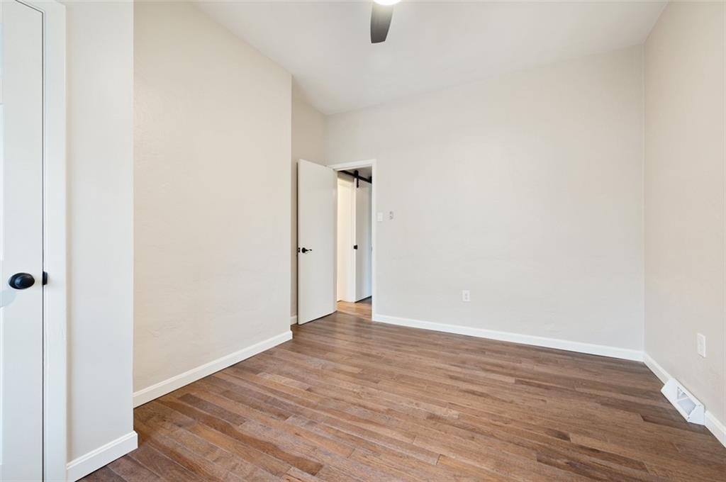 4827 Sciota Street Pittsburgh, PA 15224 - Photo 12 of 19 a view of an empty room with wooden floor