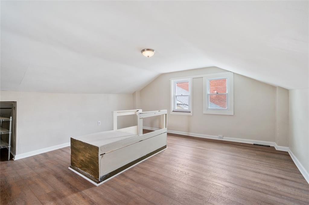 4827 Sciota Street Pittsburgh, PA 15224 - Photo 4 of 19 a view of a livingroom with wooden floor