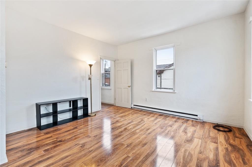 4827 Sciota Street Pittsburgh, PA 15224 - Photo 6 of 19 a view of empty room with wooden floor