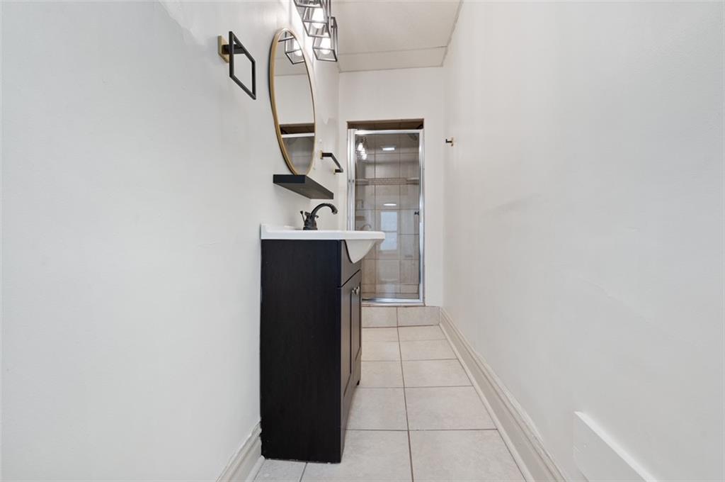 4827 Sciota Street Pittsburgh, PA 15224 - Photo 10 of 19 a view of storage and utility room with a sink