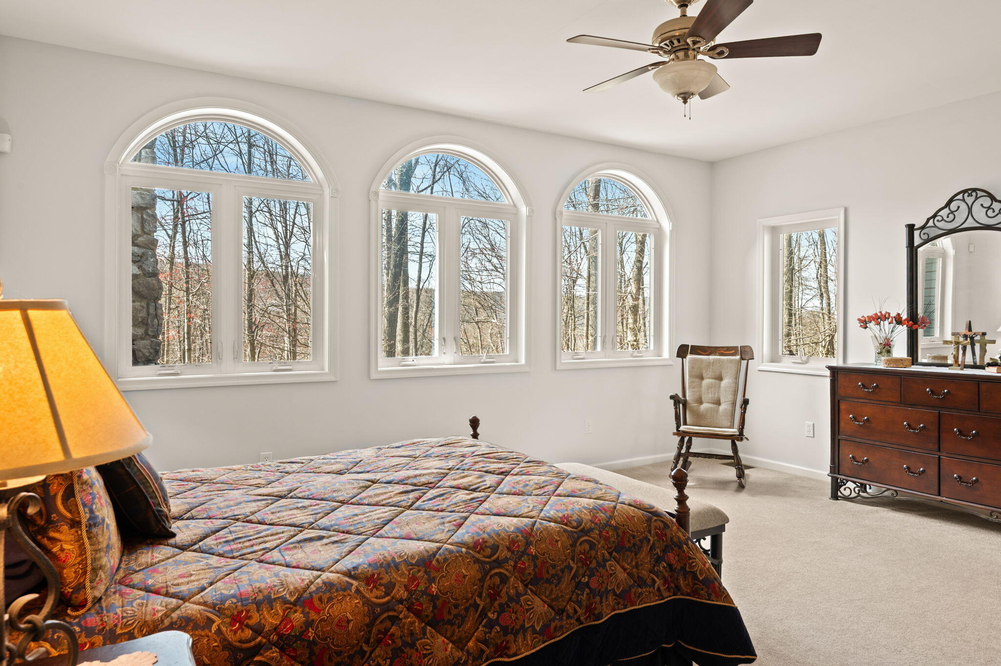 8 Kickapoo Drive Hazleton, PA 18202 - Photo 22 of 121 a bedroom with a bed and a chandelier