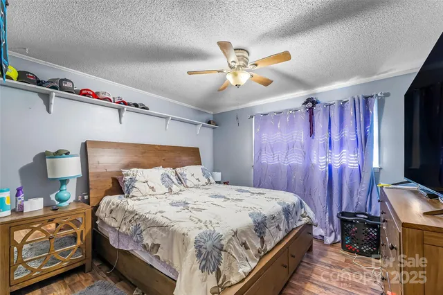 a bathroom with a toilet a sink and a mirror