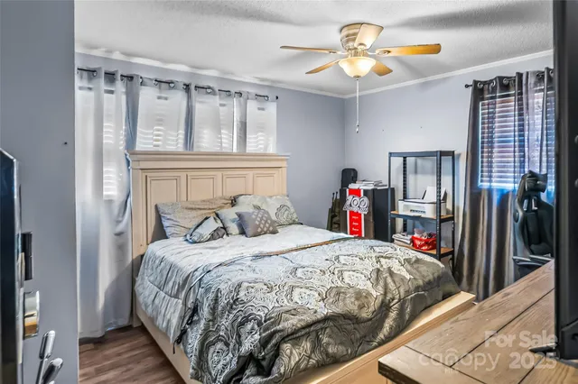 a bedroom with furniture and a fireplace