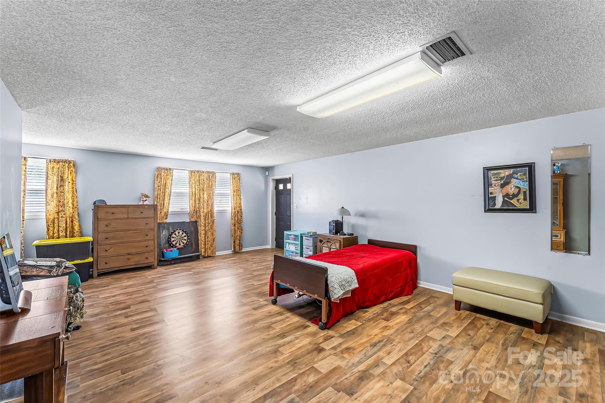 304 Parlier Avenue Conover, NC 28613 - Photo 23 of 37 a bedroom with two beds and a couch