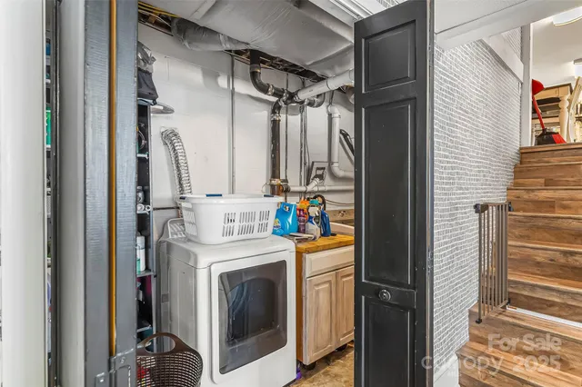 an aerial view of house with yard swimming pool and outdoor seating