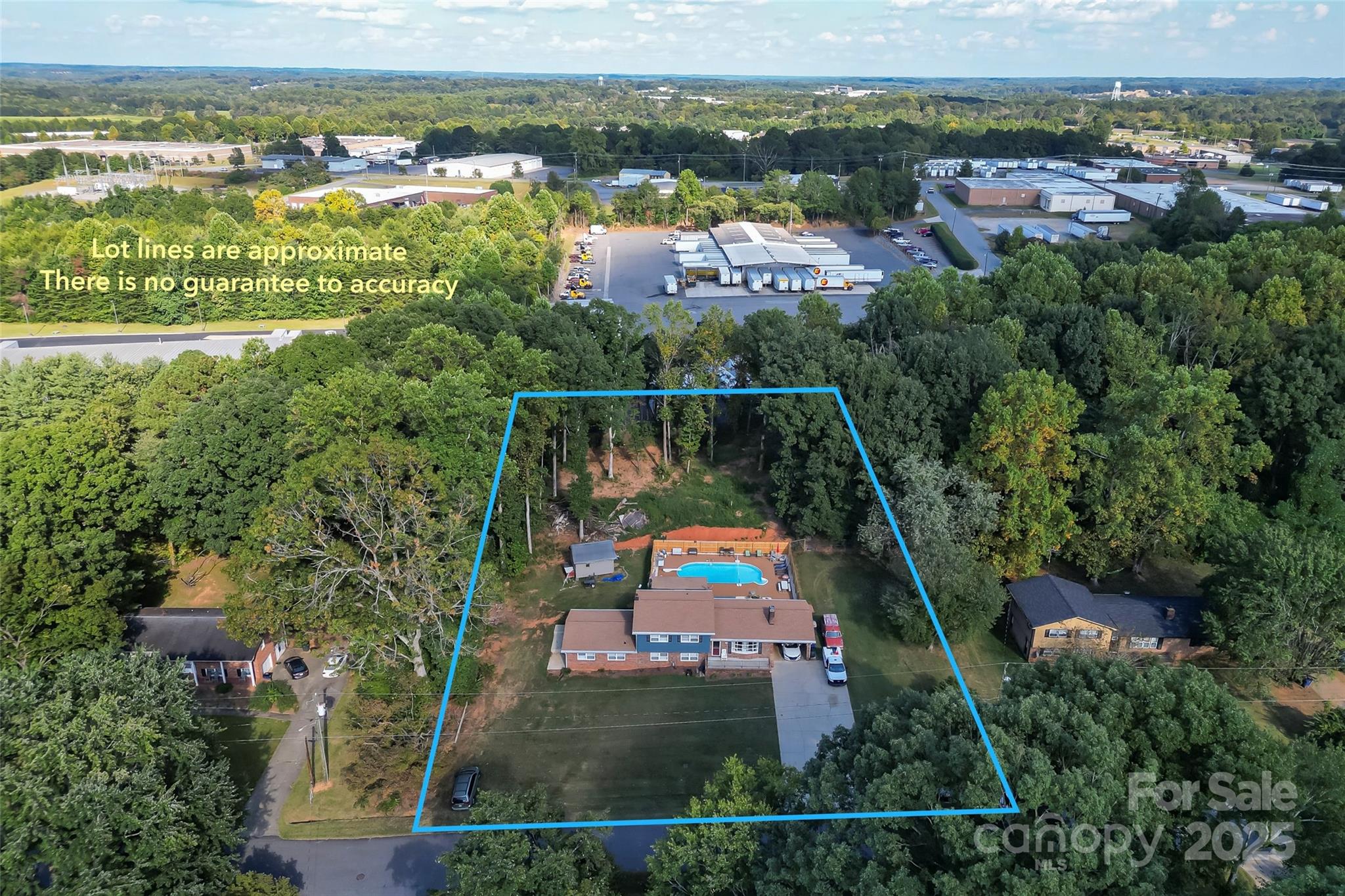 304 Parlier Avenue Conover, NC 28613 - Photo 30 of 37 an aerial view of residential houses with outdoor space and swimming pool