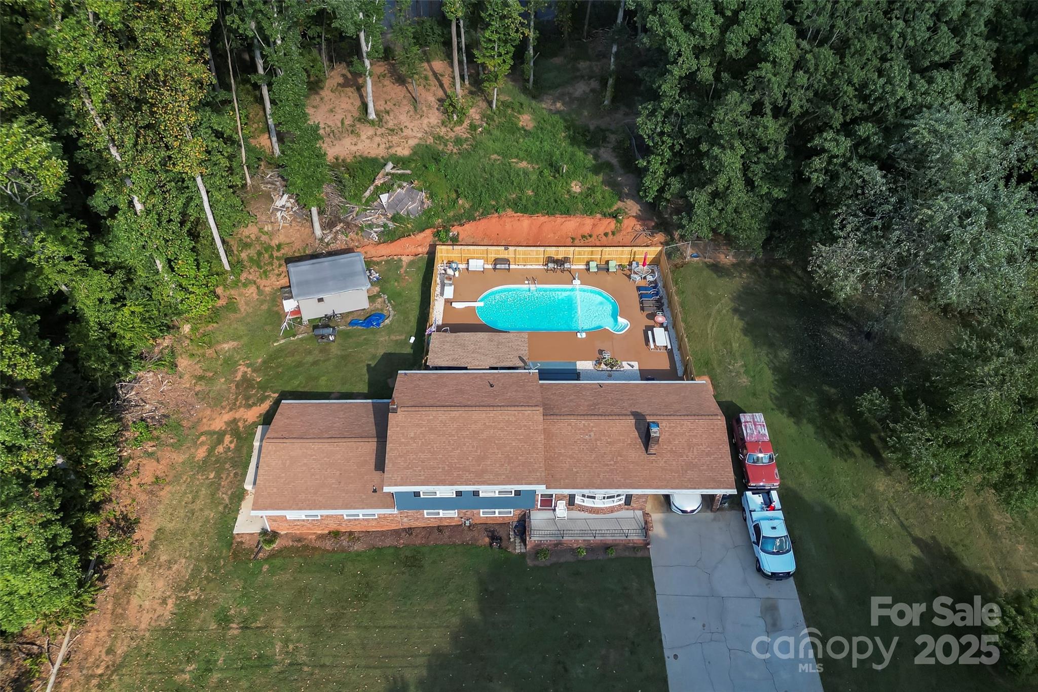 304 Parlier Avenue Conover, NC 28613 - Photo 31 of 37 an aerial view of house with yard swimming pool and outdoor seating