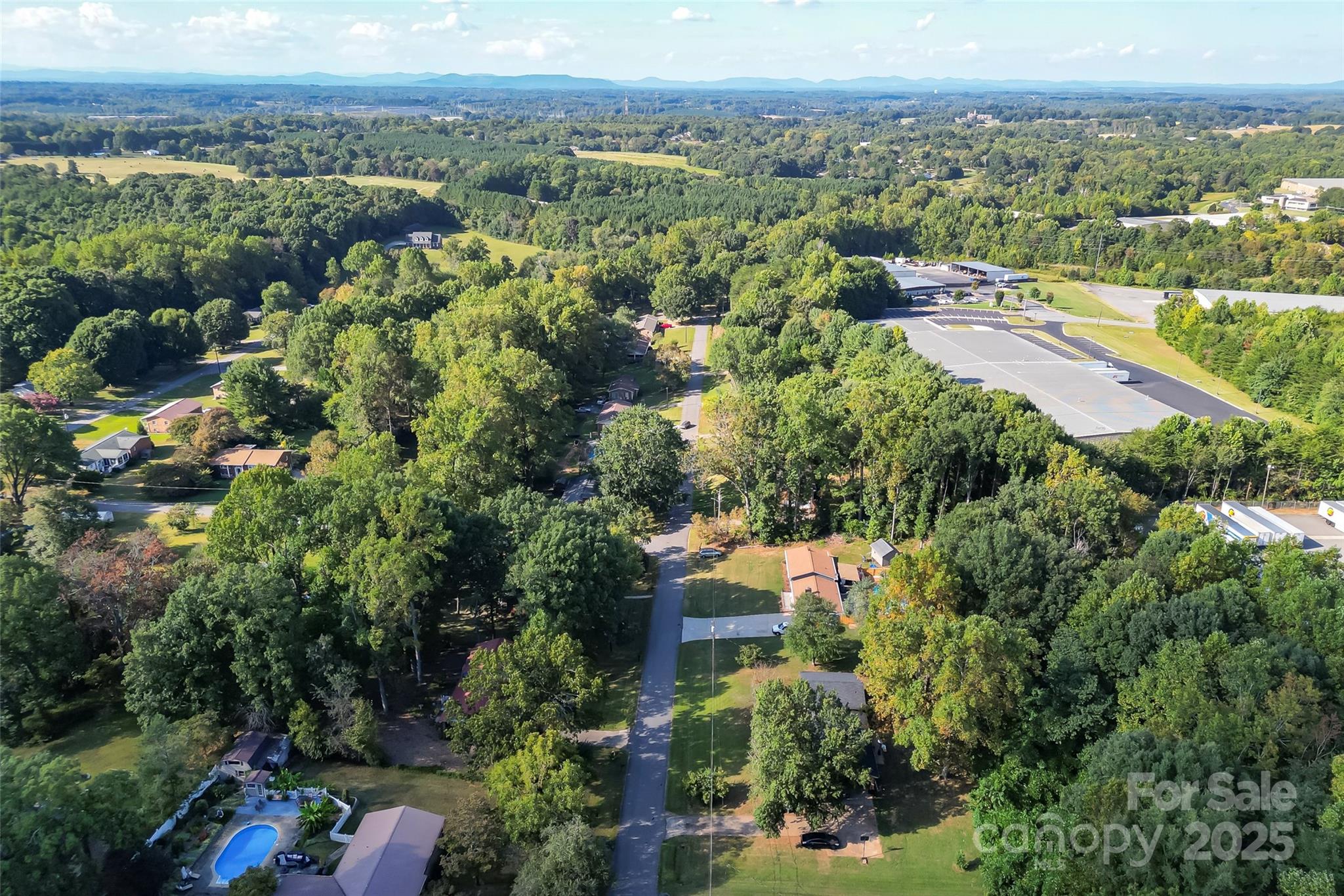 304 Parlier Avenue Conover, NC 28613 - Photo 32 of 37 an aerial view of a city with lots of residential buildings