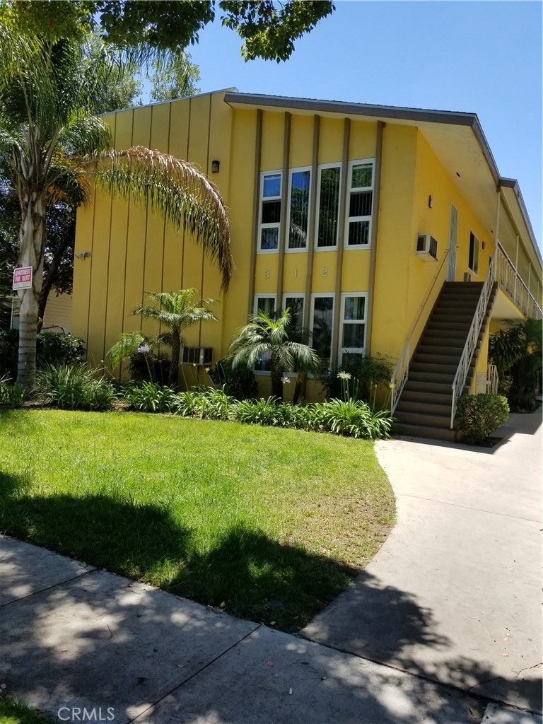 312 East Dryden Street, Unit 3 Glendale, CA 91207 - Photo 1 of 13 a view of a back yard of the house