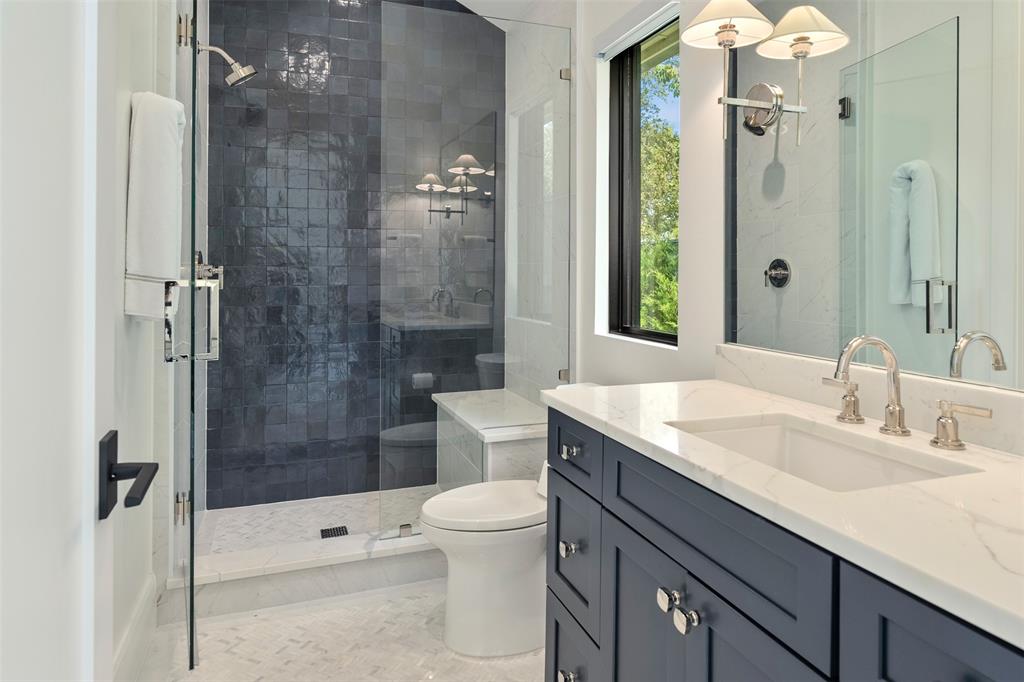 455 Sun Valley Mabank, TX 75147 - Photo 23 of 35 a bathroom with a sink a toilet and shower