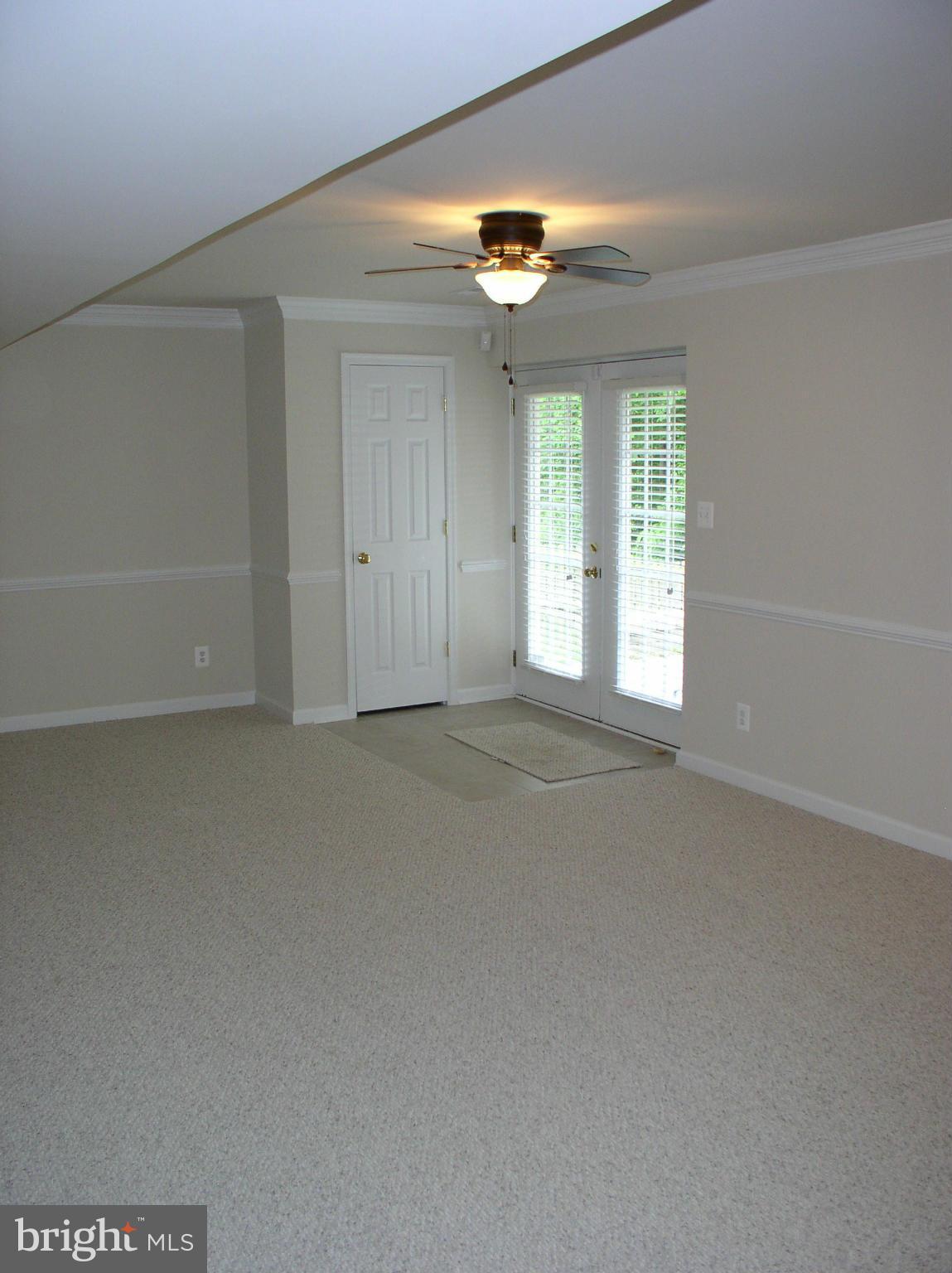 5910 A Sunlight Mountain Road, Unit A Spotsylvania, VA 22553 - Photo 13 of 24 a view of an empty room with a window