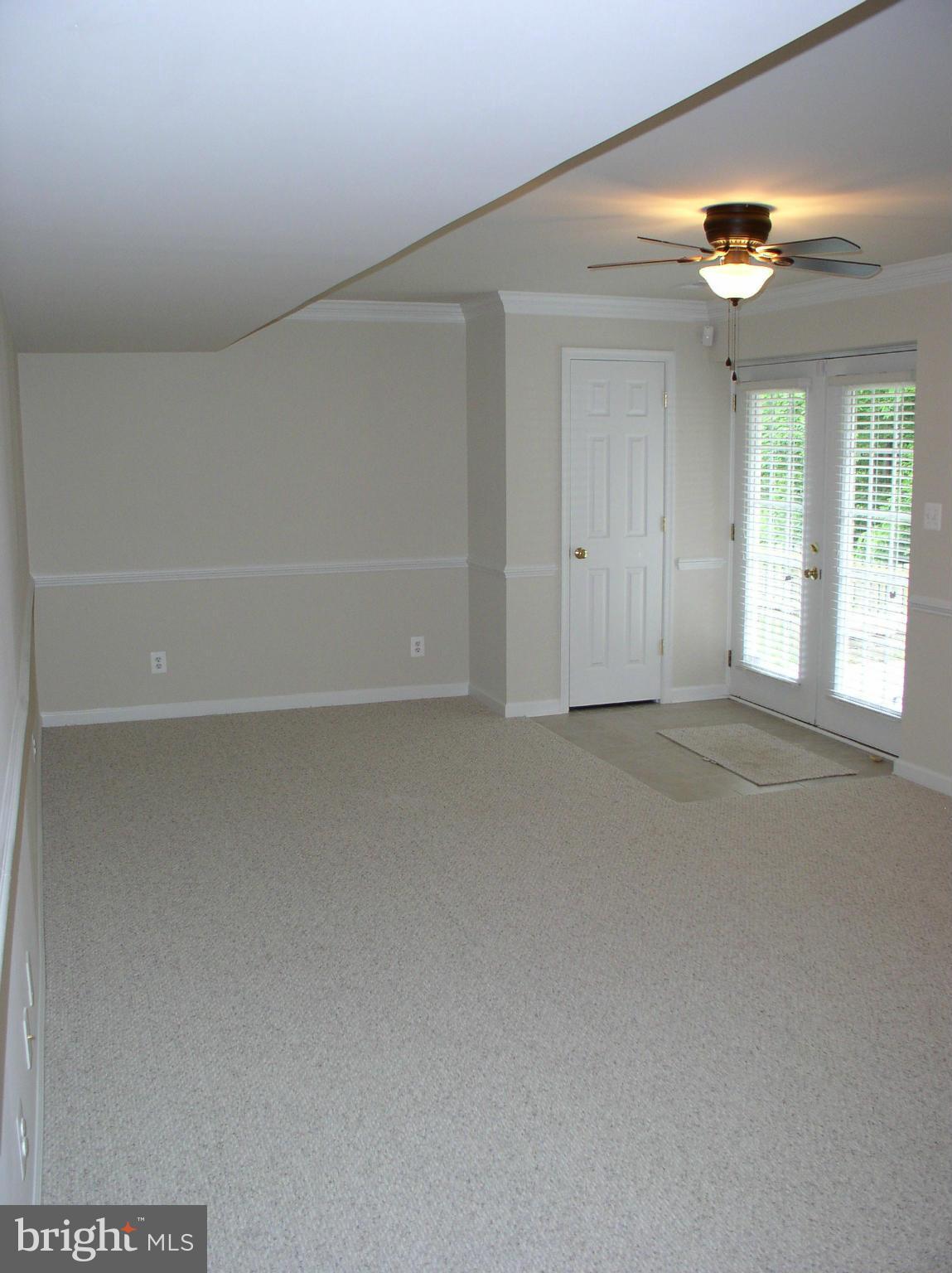 5910 A Sunlight Mountain Road, Unit A Spotsylvania, VA 22553 - Photo 14 of 24 a view of an empty room with a window