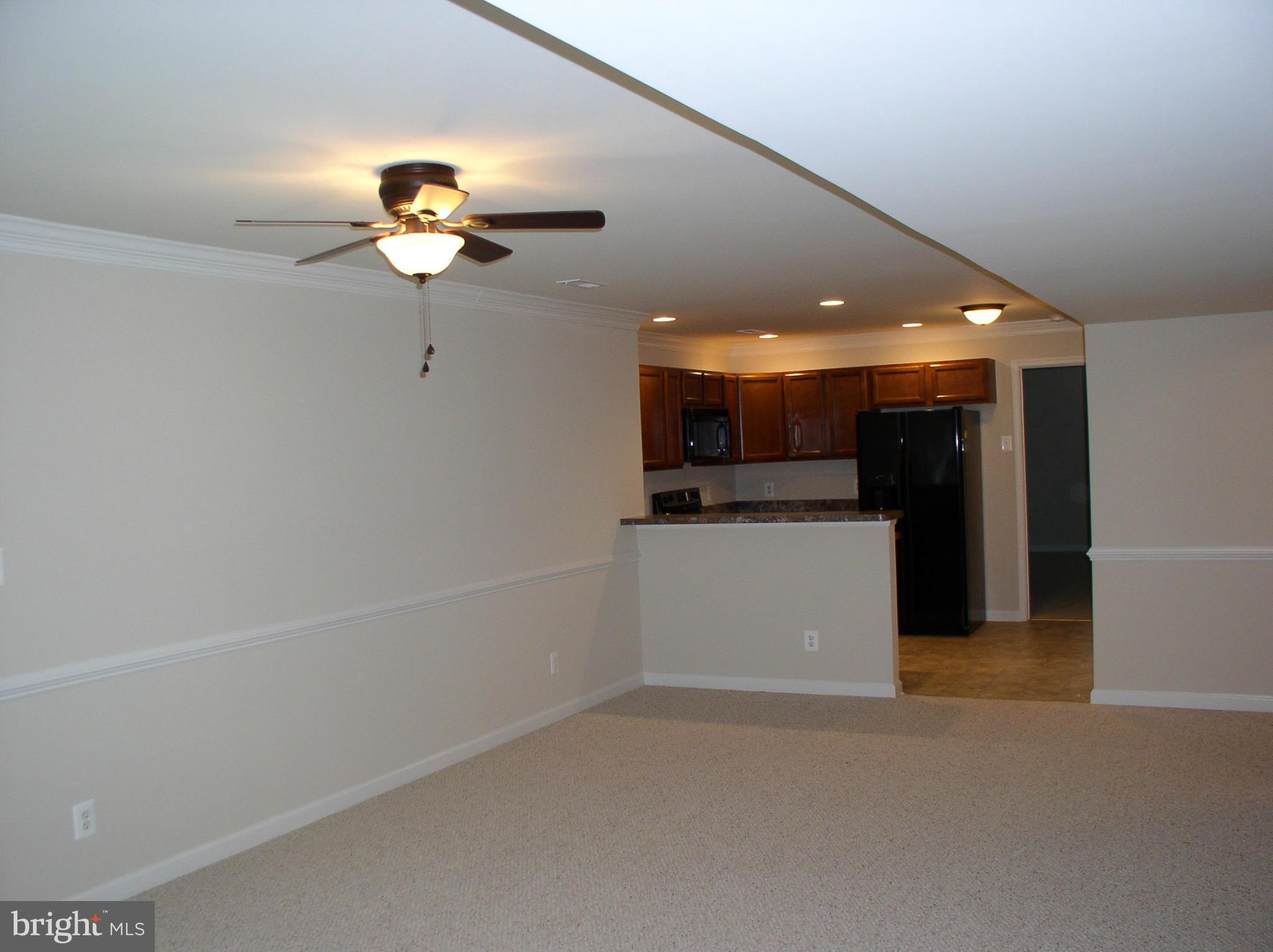 5910 A Sunlight Mountain Road, Unit A Spotsylvania, VA 22553 - Photo 15 of 24 a view of a kitchen with a dishwasher and a refrigerator