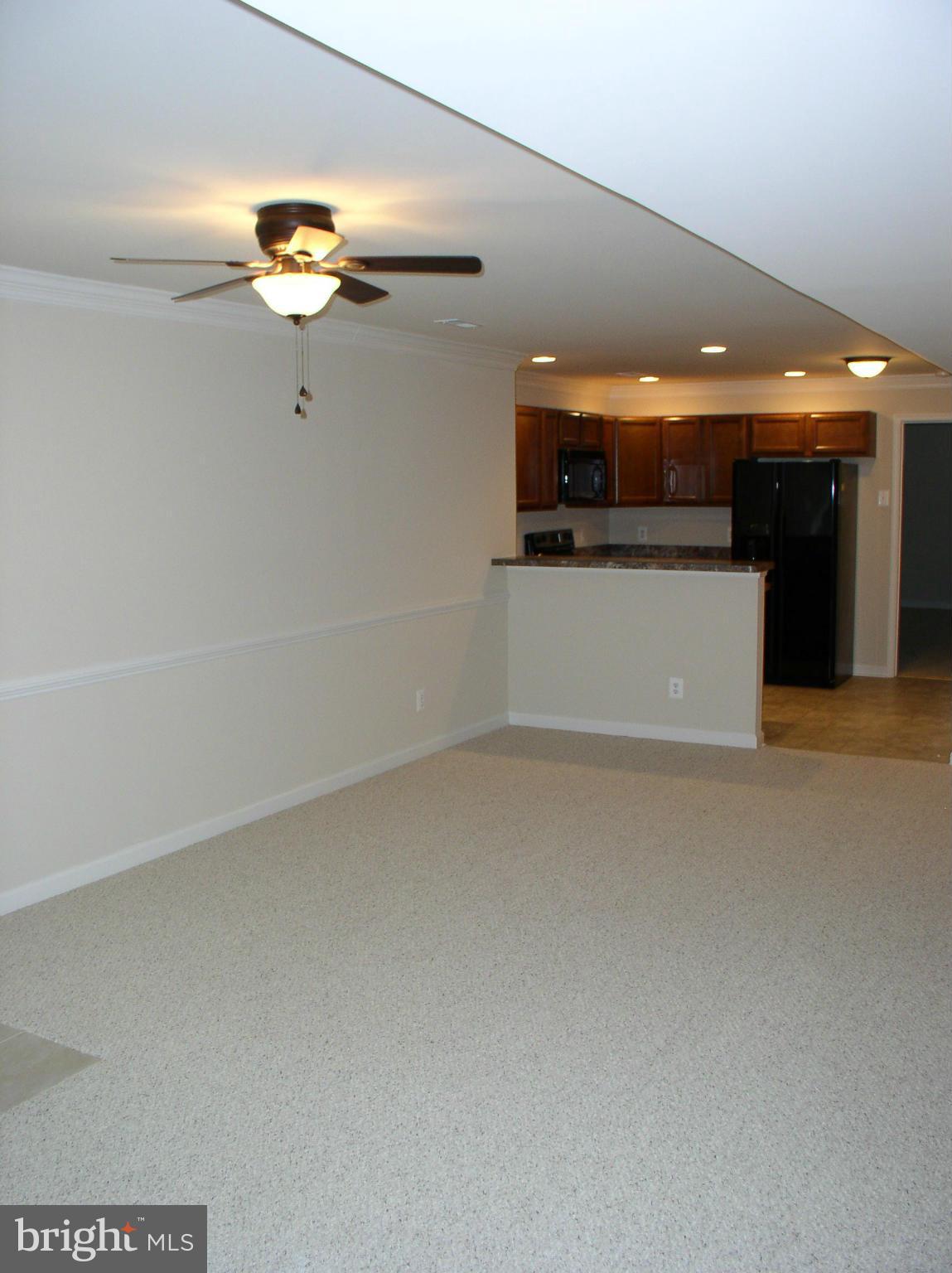 5910 A Sunlight Mountain Road, Unit A Spotsylvania, VA 22553 - Photo 16 of 24 a view of an empty room with a window