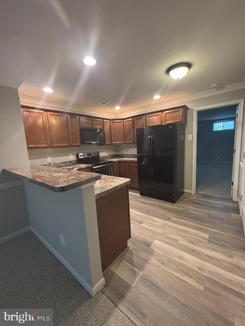 5910 A Sunlight Mountain Road, Unit A Spotsylvania, VA 22553 - Photo 2 of 24 a kitchen with stainless steel appliances granite countertop a stove a sink and a refrigerator