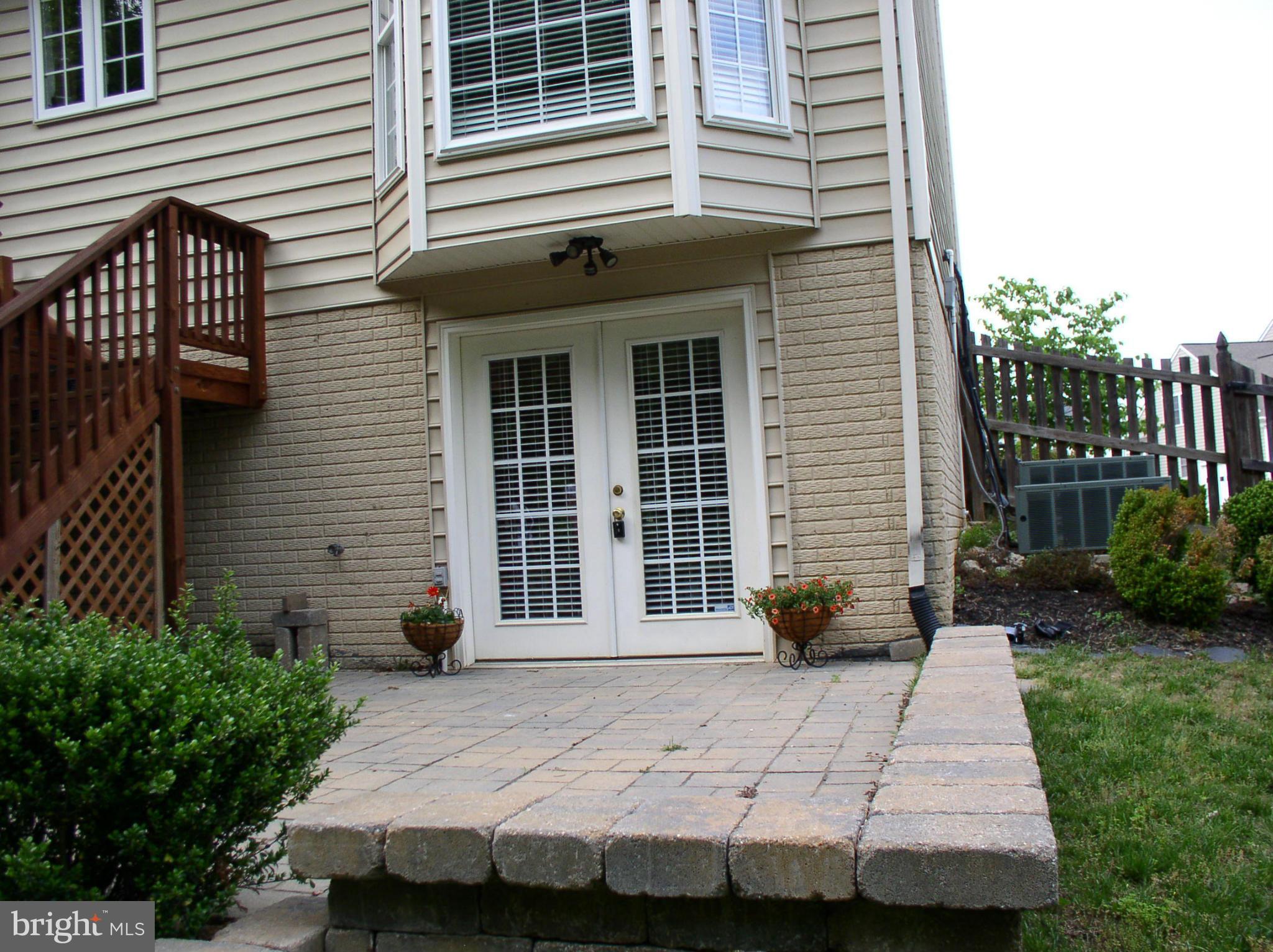 5910 A Sunlight Mountain Road, Unit A Spotsylvania, VA 22553 - Photo 23 of 24 a front view of a house with a yard