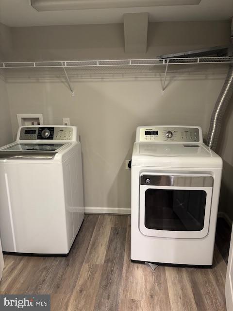 5910 A Sunlight Mountain Road, Unit A Spotsylvania, VA 22553 - Photo 8 of 24 a utility room with wooden floor washer and dryer