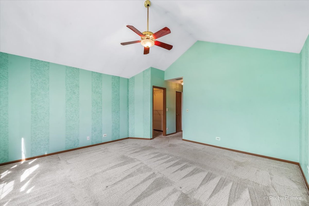 687 Bent Ridge Lane Elgin, IL 60120 - Photo 15 of 28 a view of a livingroom with a ceiling fan and window