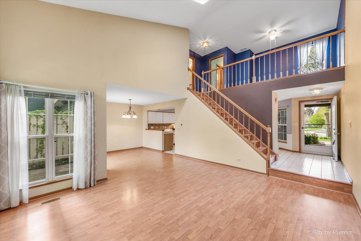 687 Bent Ridge Lane Elgin, IL 60120 - Photo 2 of 28 a view of entryway and hall with wooden floor