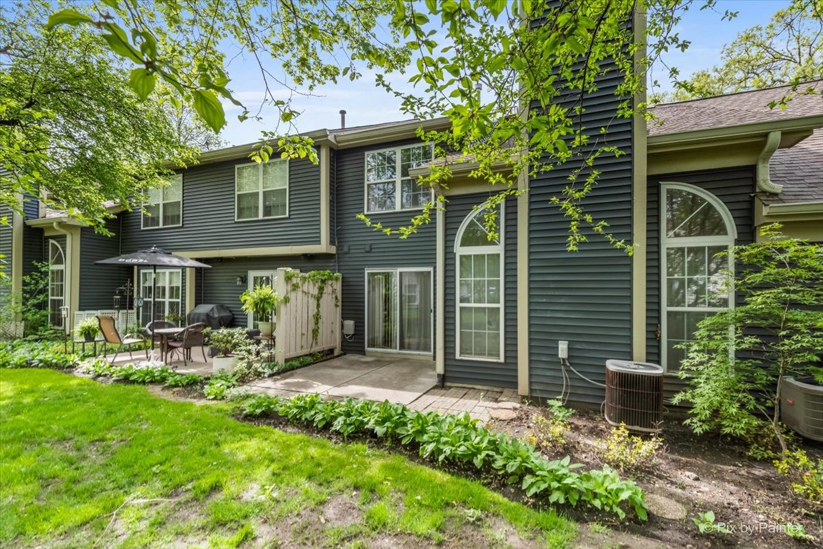 687 Bent Ridge Lane Elgin, IL 60120 - Photo 28 of 28 a front view of a house with patio