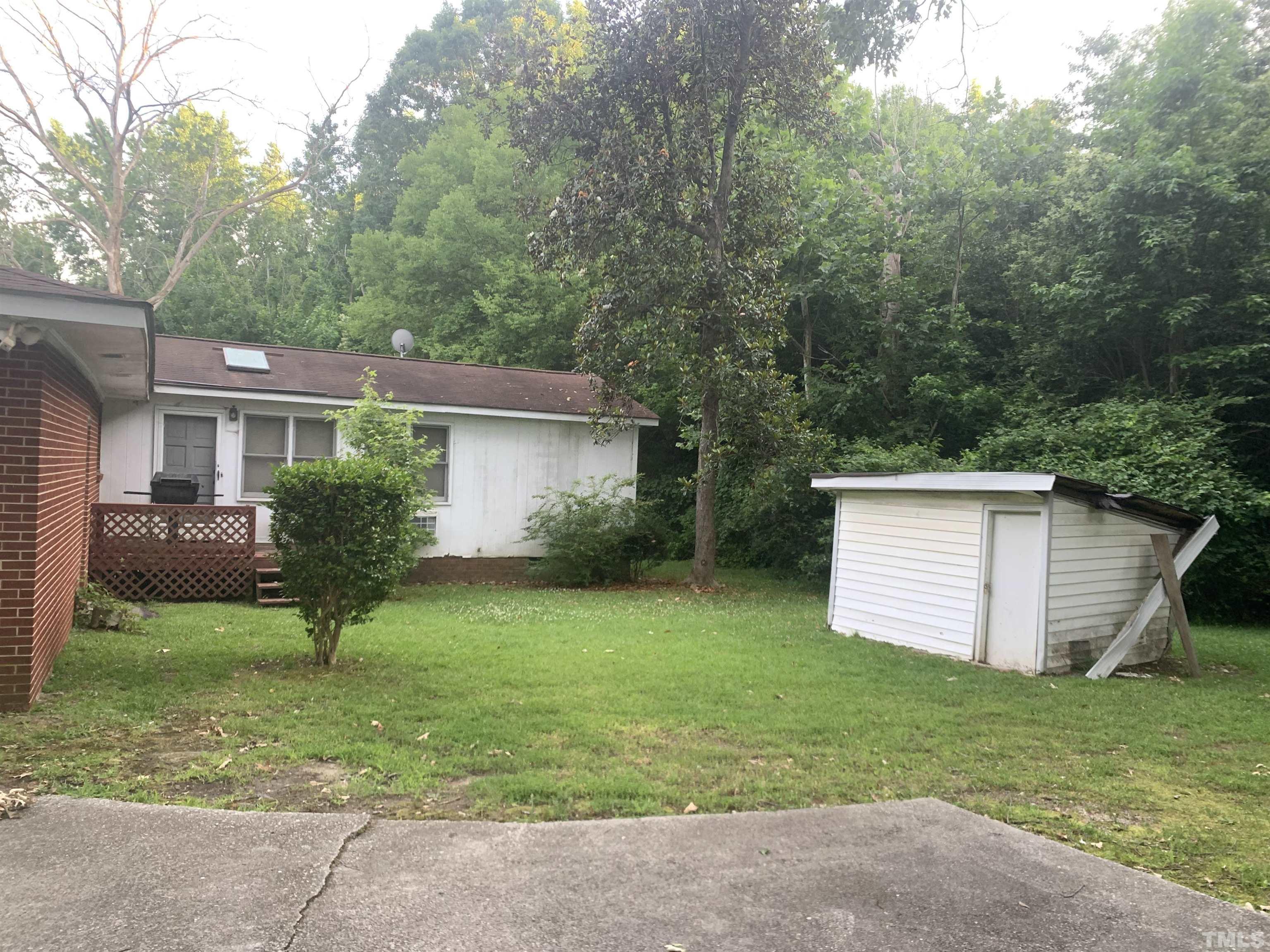 917 Cross Link Road Raleigh, NC 27610 - Photo 4 of 10 a front view of a house with garden