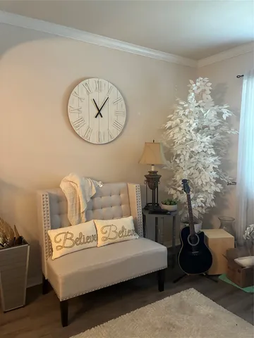 a living room with furniture and decor