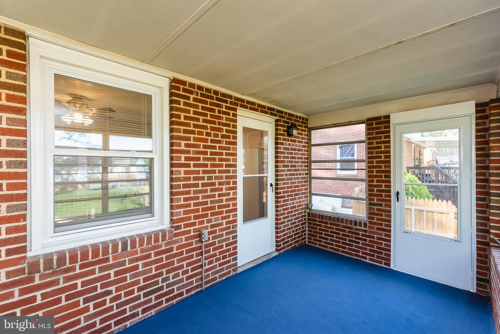 8725 Avondale Road Baltimore, MD 21234 - Photo 29 of 36 New door to exterior of enclosed porch