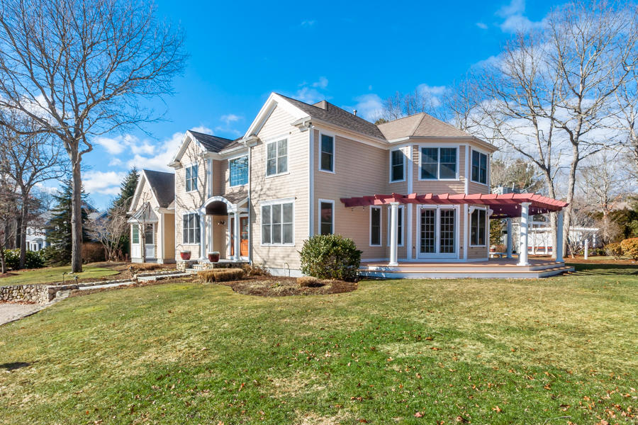 19 Reflection Drive Sandwich, MA 02563 - Photo 1 of 33 front view of a building with a yard