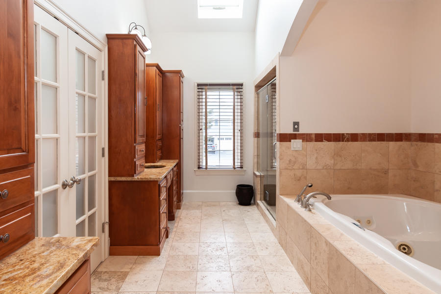 19 Reflection Drive Sandwich, MA 02563 - Photo 13 of 33 a bathroom with a bathtub and shower