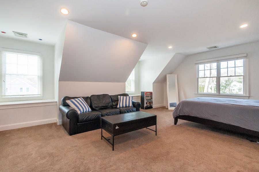 19 Reflection Drive Sandwich, MA 02563 - Photo 14 of 33 a living room with furniture and a window