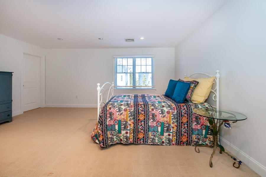 19 Reflection Drive Sandwich, MA 02563 - Photo 15 of 33 a bedroom with bed and a window