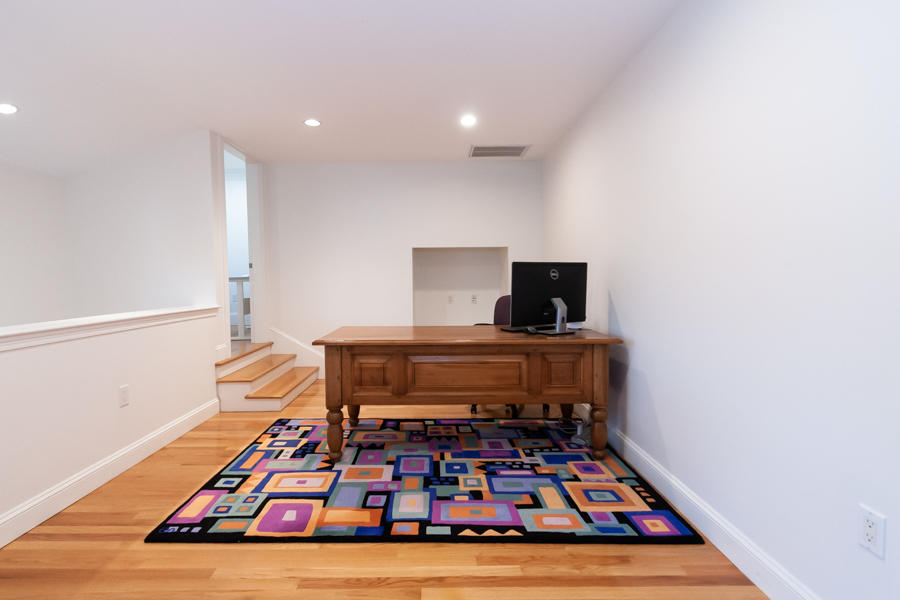 19 Reflection Drive Sandwich, MA 02563 - Photo 19 of 33 a living room with furniture and a rug