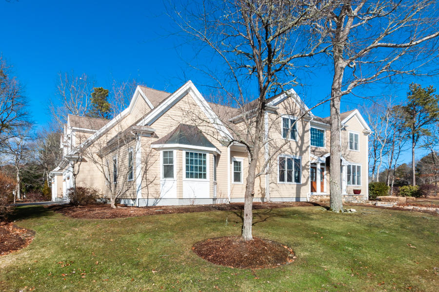 19 Reflection Drive Sandwich, MA 02563 - Photo 2 of 33 a front view of a house with a yard