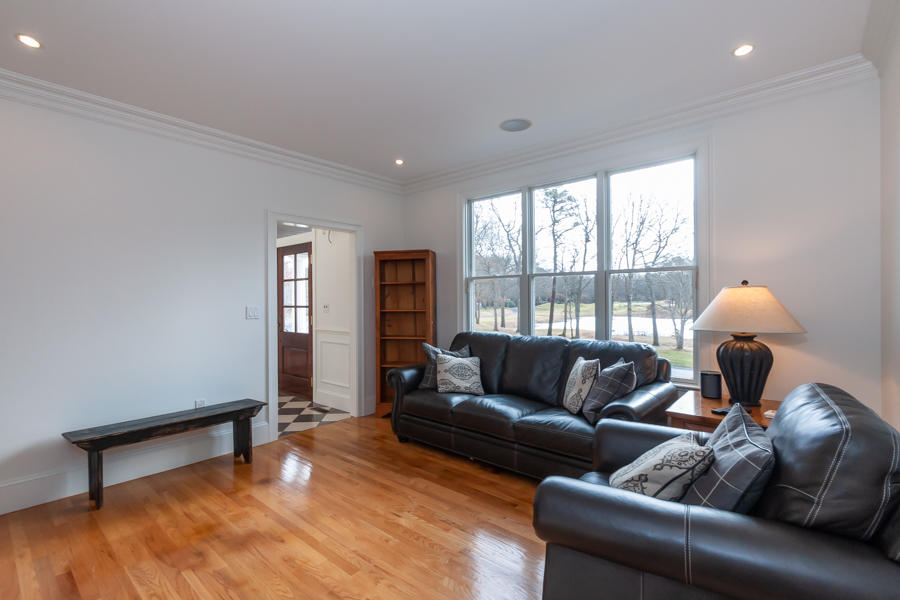 19 Reflection Drive Sandwich, MA 02563 - Photo 21 of 33 a living room with furniture and a window