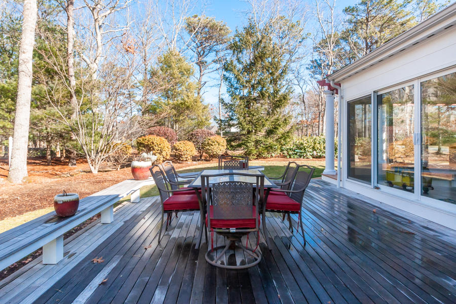 19 Reflection Drive Sandwich, MA 02563 - Photo 28 of 33 a view of a chairs and table on the wooden floor