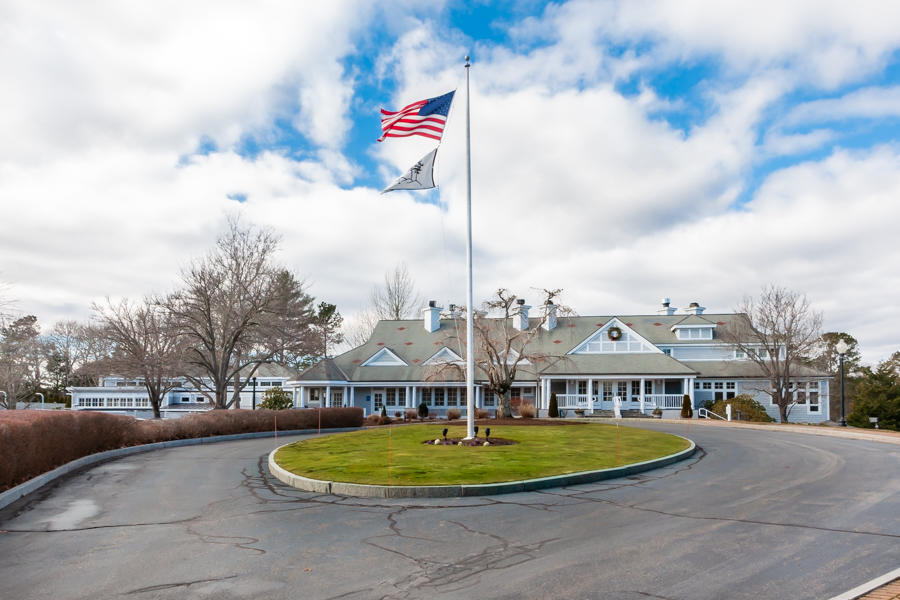 19 Reflection Drive Sandwich, MA 02563 - Photo 29 of 33 a view of a white house with a swimming pool and a yard
