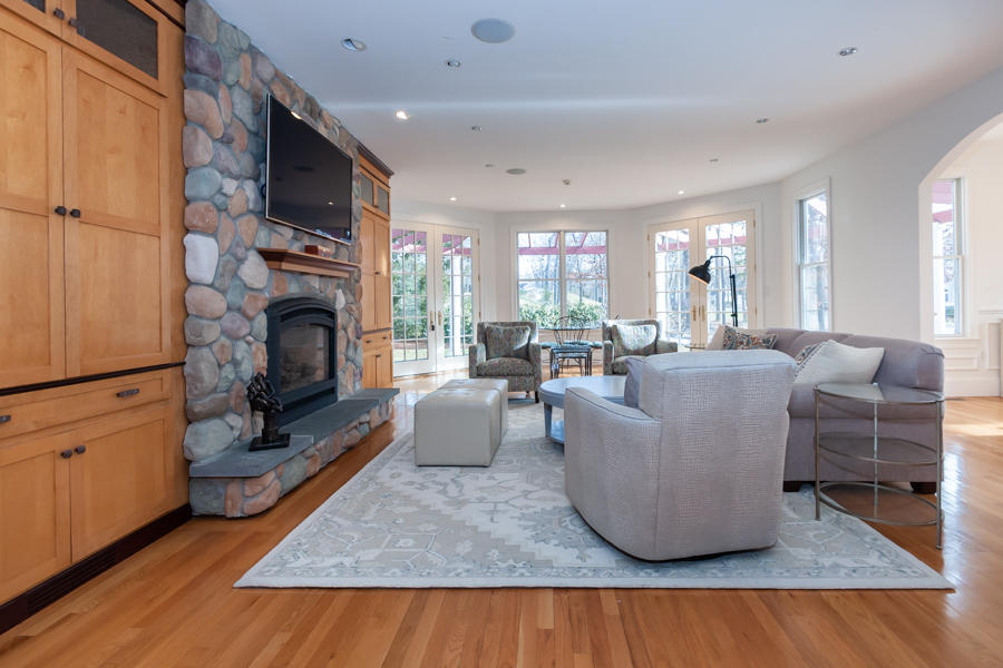19 Reflection Drive Sandwich, MA 02563 - Photo 6 of 33 a living room with furniture and a fireplace