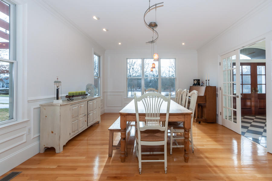 19 Reflection Drive Sandwich, MA 02563 - Photo 7 of 33 a view of a dining room with furniture window and wooden floor