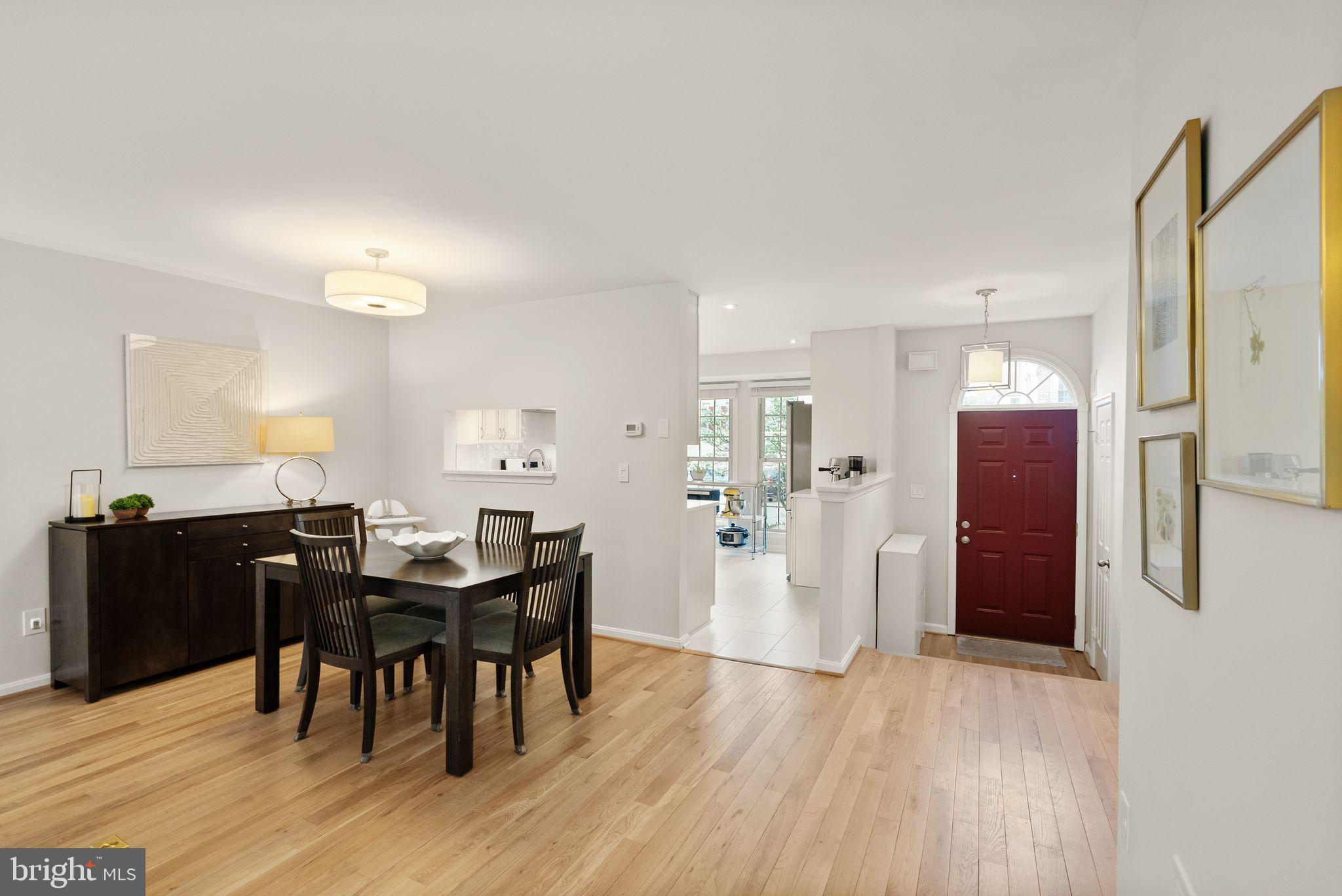 6369 English Ivy Way Springfield, VA 22152 - Photo 9 of 62 a view of a dining room with furniture and wooden floor