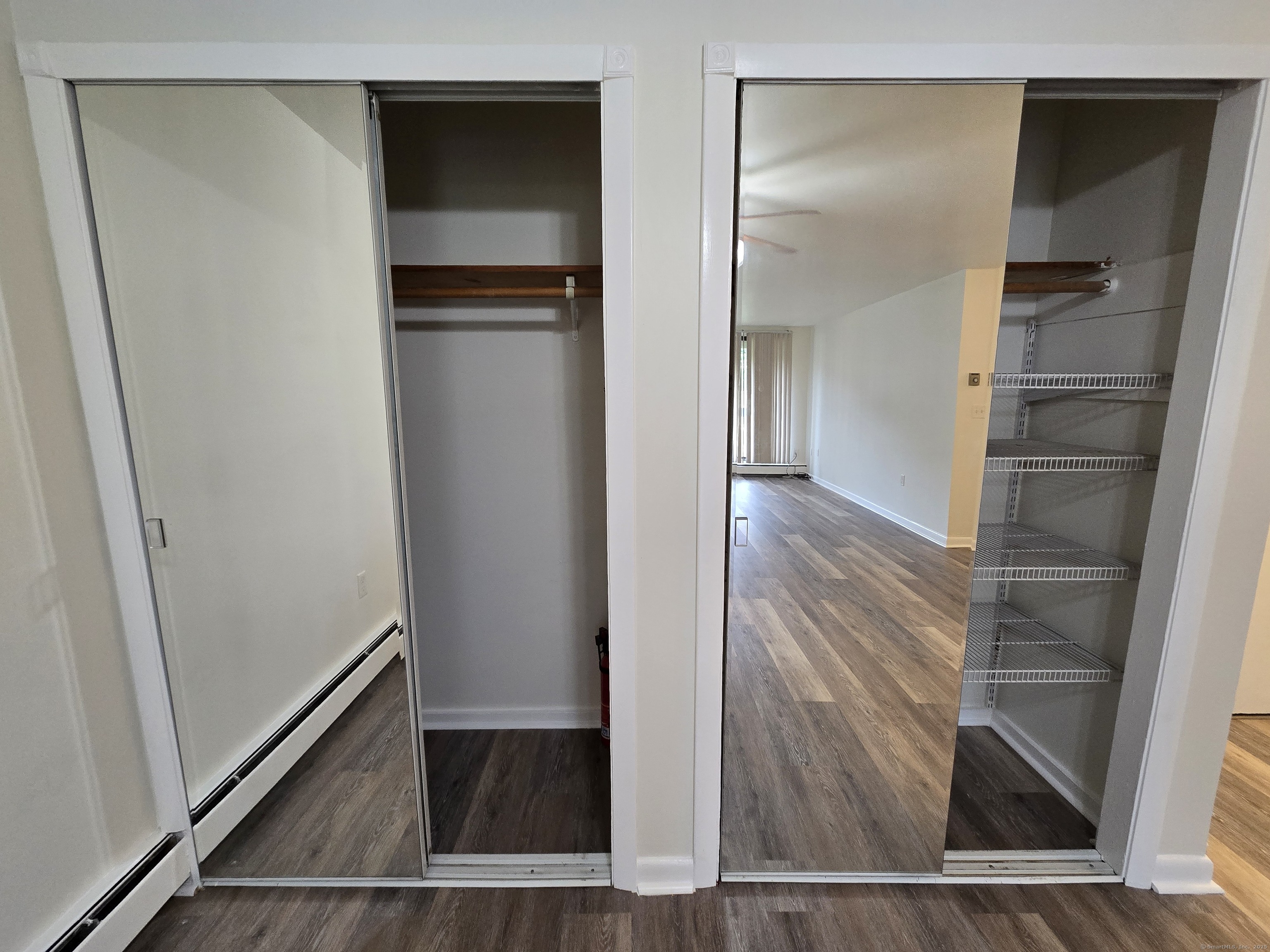 1209 Cromwell Hills Drive, Unit 1209 Cromwell, CT 06416 - Photo 12 of 27 a view of walk in closet with empty racks