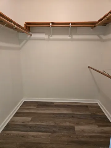 a view of a room with racks on the wall